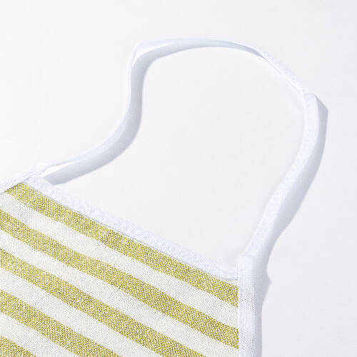 Un grembiule di lino per la sublimazione - crema con strisce verde chiaro