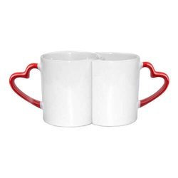 Due Tazze con manici rossi a forma di cuore